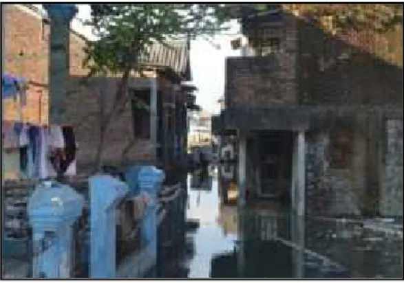 Gambar 2. Banjir Rob Menggenangi Rumah dan Jalan
