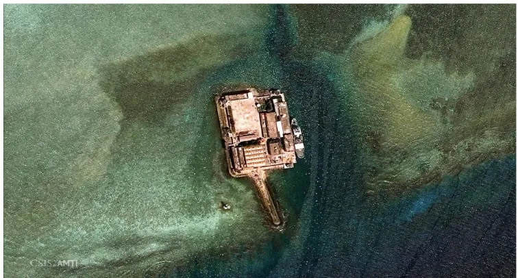 Gambar 1.5 Konstruksi berbeton milik China yang mulai dibangun padadibangun melalui gambar diatas yang diambil pada tanggal 22 Januari 2006tahun 1990 di Fiery Cross Reef