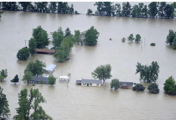 Gambar 5. Banjir yang merendam pemukiman warga  a.  Pengertian 
