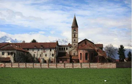 Figure 1. The Cistercian Staffarda Abbey with the snowy Alps in the background. (CN) Piedmont – Italy