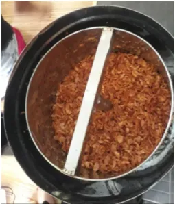 Gambar 5. Uji coba alat peniris bawang 