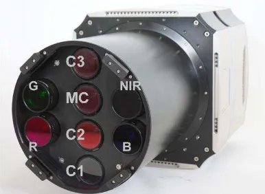 Figure 3a: UltraCam Eagle front plate with 4 cones for the panchromatic image (MC, C1,C2 and C3) and 4 cones for multispectral  data acquisition R,G,B,NIR)