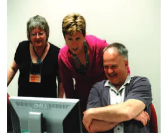 Figure 6. Debbie Stevens (IA), Rachel Headley (SD) and Hector Douglas (AK) in the computer lab
