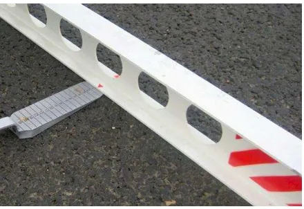 Figure 1. Measuring road surface parameters with level bar and wedge ruler  