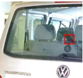 Figure 5: View onto the test car windshield against the drivingdirection. The front environment camera (red rectangle) is look-ing at the area in front of the car and the interior driver camera(purple rectangle) is looking at the car driver