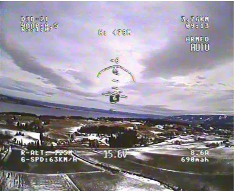 Figure 3. Screenshot of the live video feed of the front camera with overlaid flight data during an autonomous flight over the test area 