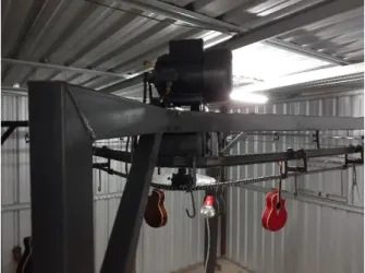 Gambar 6. Model sistem overhead chain conveyor untuk pengeringan gitar dengan penggerak motor listrik 1HP Keterangan: 