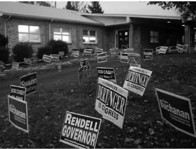 Figure 7.1 Campaign signs outside a polling place in East Greenville, PA, under-score the intensity of the 2006 election