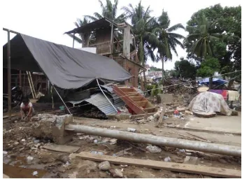 Gambar 1.2 Kerusakan parah rumah penduduk yang berada di bantaran Sungai Tondanau 