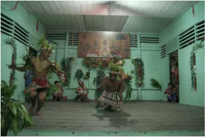 Figure 5. Members of Sakuddei group perform their traditional dances in the church during the presentation of the CDs (photograph by G