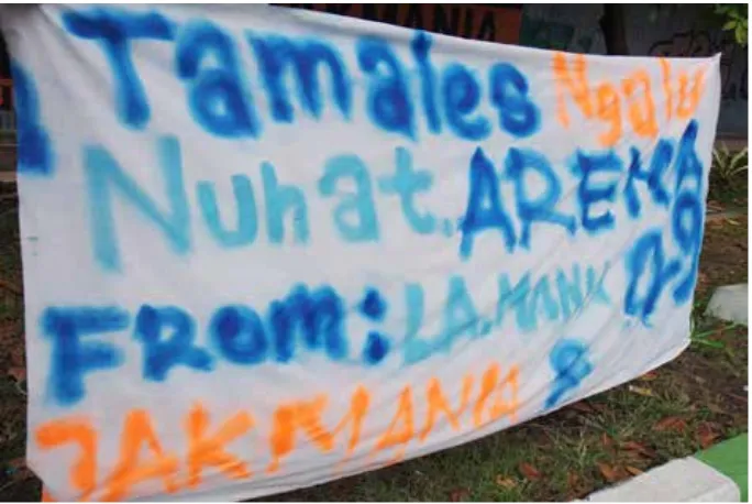 Figure 4. Walikan on a banner during Arema FC’s anniversary  Ayas kèra Ngalam (< Saya arèk Malang) ‘I am a Malang kid’.