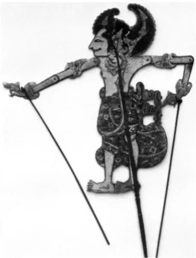 Figure 1.2. The Balinese puppet, Arjuna, the third Pandhawa brother. This puppet Java (see, for instance, the photo of the relief at Candi Surawana on the companion shows an older shape for wayang puppets, close to ﬁ gures depicted on the walls in East web