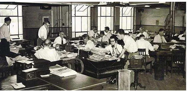 Gambar 3. Ruang redaksi Journal-American, pemandangan generik suratkabar AS kala itu sebelum kehadiran 