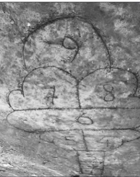 Figure 3. Using buluh belangke in drawing the ceng-kah-cengkah arena on the ground