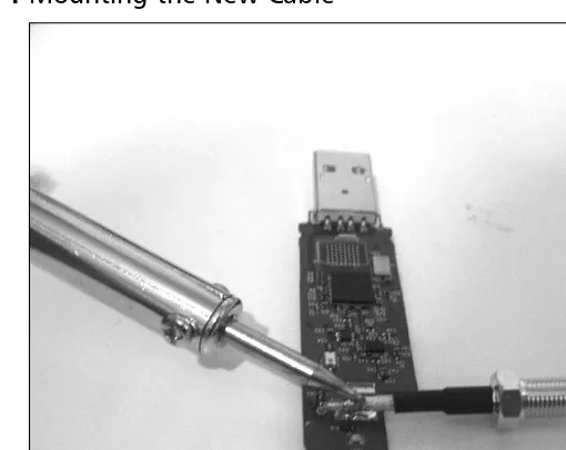 Figure 2.14 Mounting the New Cable 
