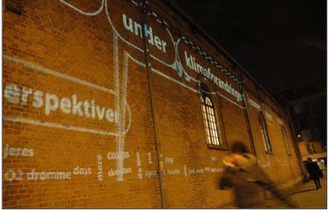 Figure 1. Visitors interacting with Aarhus by Light. 