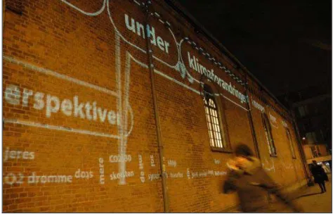 Figure 1. Visitors interacting with Aarhus by Light. 