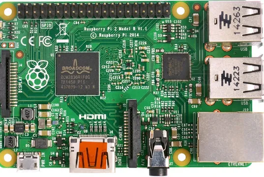 Figure 2-1. A Raspberry Pi (note the GPIO pins running across the top of the board)