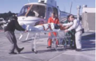 Figure 5.8 Helicopter transfer of a spinally injured patient.