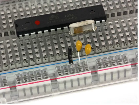 Figure 1-4. ATMega with capacitors, crystal, and ground wire