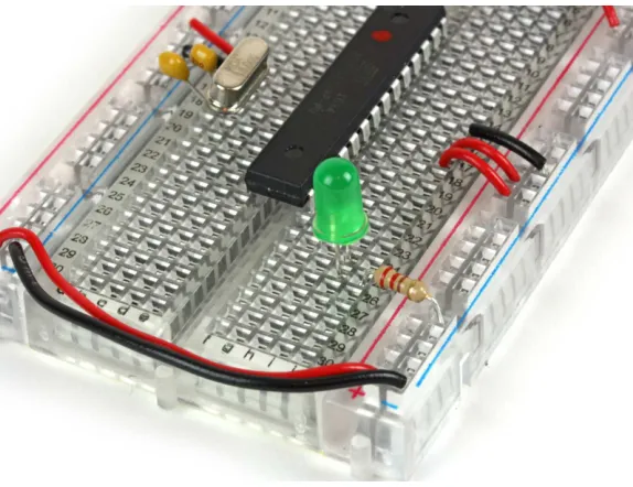 Figure 1-5. ATMega with power connections and an LED