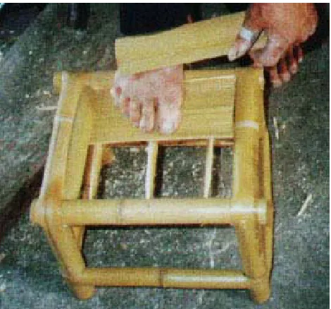 Figure 4. Weaving bamboo strips into a seat top. 