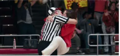 Figure 4. The Female Coach Kissing the Referee (00:05:51) 