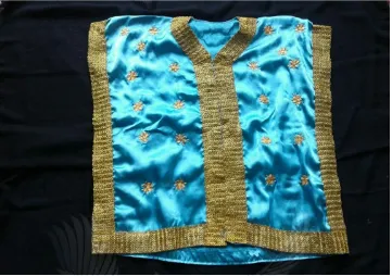 Gambar 4: Lamung dapang (baju bagian atas) digunakan oleh penari Ser 