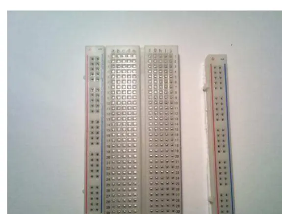 Figure 1-4. Cutting one power strip away from the mini breadboard 