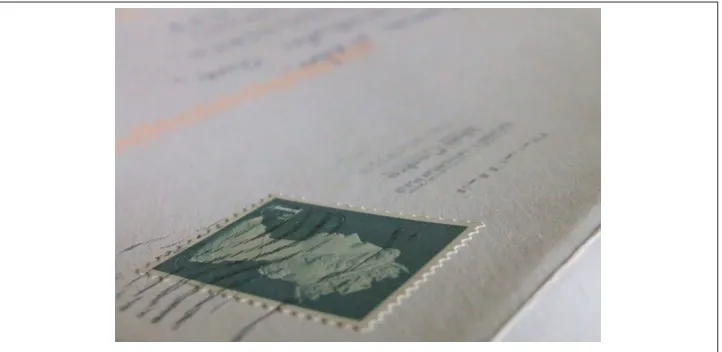 Figure 3-1. Envelope with stamp, address, and postmark