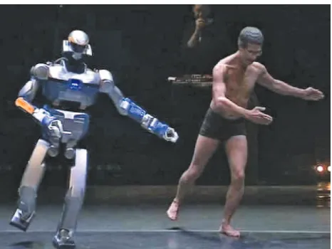 Figure 1. The humanoid robot HRP-2 and a hip-hop dancer. 