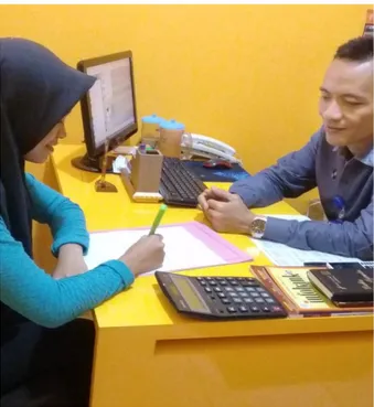 Foto 1. Wawancara dengan Bapak DL Selaku Kepala Kantor Kas 