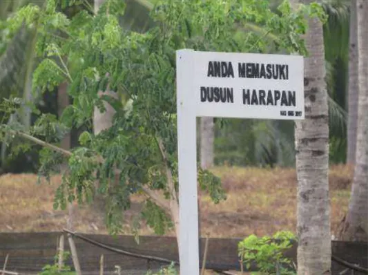 Gambar 5.8. Foto Plang Dusun Harapan Desa Helumo 