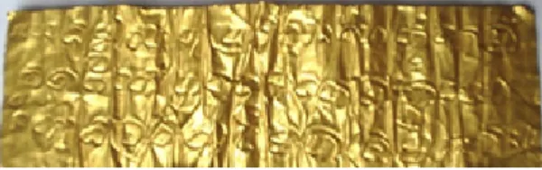 Foto 1. Salah satu lempeng emas berisi mantra  Buddha  yang  ditemukan  di  Situs  Padang  Candi  memiliki  jenis  huruf  dari  abad  8  M  (Dok