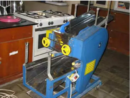 Gambar 6. Mesin mi (pressing, slitting, dan cutting) 