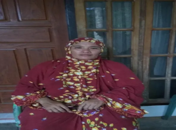 Foto 3. Istri Buya Syaikhul, diambil saat wawancara pada tanggal 22 Juli 2018 di              Kampung Dalam 
