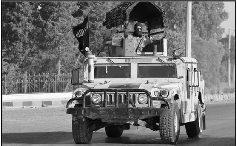 Gambar 2.1. Milisi ISIS menaiki mobil  humvee 