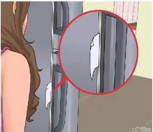 Gambar Memeriksa kerapatan pintu kulkas