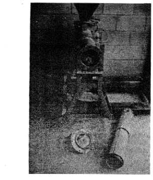 Fig. 10. The polisher showing the aberasive stone disk. 