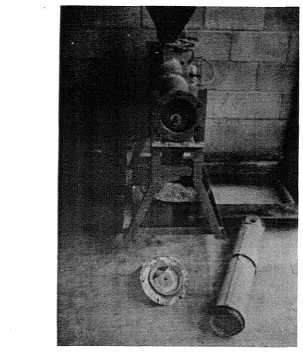 Fig. 10. The polisher showing the aberasive stone disk. 