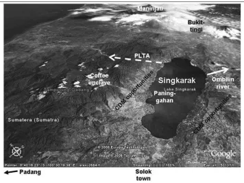 Figure 9.1. Bird’s-eye  view  of  Lake  Singkarak  in  the  rift  valley  amidst  the  Bukit  Barisan the Ombilin river has been reduced to an ‘overlow’ channel, most of the water now passes through a tunnel to a hydroelectric scheme (PLTA) to the west; the village of Paninggahan west of the lake and the rice paddies at lake level; while the natural outlow of the lake to the lake from the Indian Ocean on the left (west), the grass covered hills to the east and mountain chain, which runs the length of the island, the forested escarpment that separates owns a coffee enclave in the natural forest zone