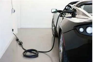 Figure 1.1: Example of electric car using plug in cable 