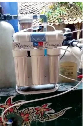 Gambar 4. Pemasangan sistem reverse osmosis pada  sistem pengolahan air yang lama 
