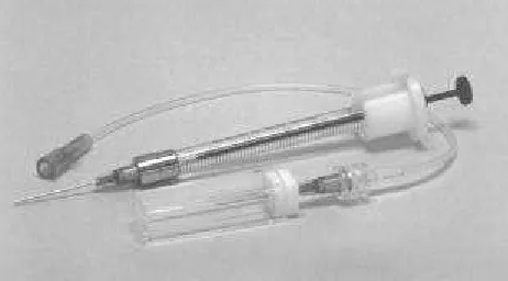 Figure 1.  Syringe, cuvet and needles. 