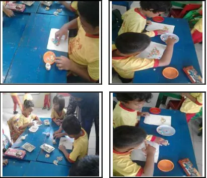 Gambar 3. Anak sedang Membuat Mozaik Bentuk Caping Menggunakan Potongan Kertas (Sumber : Hasil Observasi Peneliti 2015) 