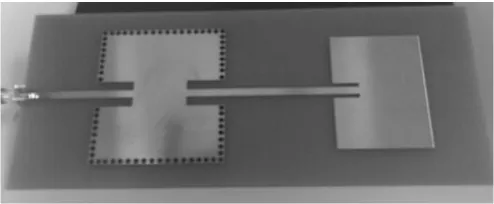 Fig. 11. Fabricated design for cascaded structure between rectangular SIW filter and  rectangular microstrip patch antenna 