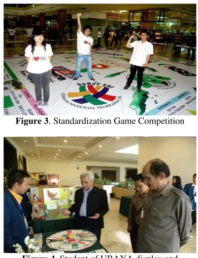 Figure 4. Student of UBAYA display and demonstrate some of standards games with visitors of the exhibition 