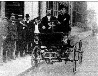 Figure 1.1: George B. Selden, In Car Powered By His Original Engine Built In 1877 (Source:www.corbisimages.com/Enlargement/PG10039C.html) 