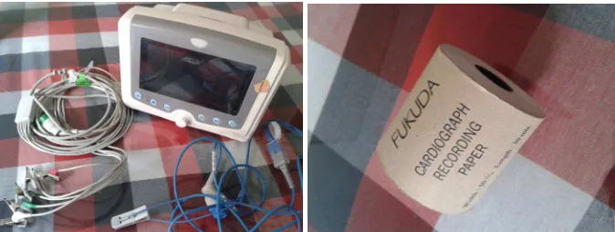 Gambar 1. Alat Fisiograf Sinohero Model S70Vet (kanan); Fukuda Cardiograph Recording Paper (kiri 