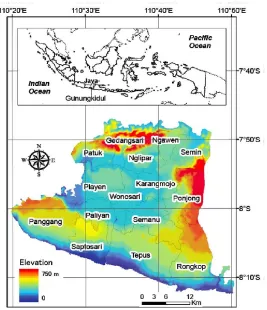 Figure 1. he 18 sub-districts of Gunungkidul and its topography. he varia-tions in elevations show distinct landscape characteristics of each district.